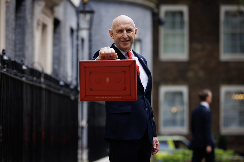 “Chancellor John Healey prepares to deliver the Budget” by HM Treasury, CC BY-NC-ND 4.0